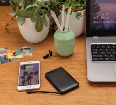 Logotrade promotional giveaway picture of: 5.000 mAh Pocket Powerbank with integrated cables