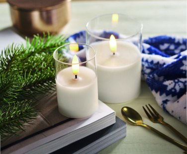 Logo trade meene pilt: LED vahaküünal klaasihoidjas