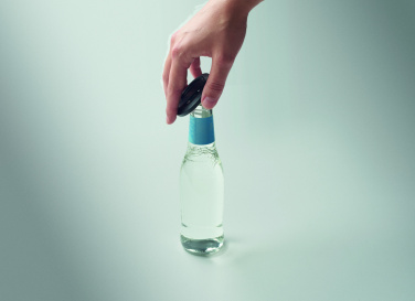 Logo trade mainostuotet tuotekuva: Puhelinpidike ja pullonavaaja